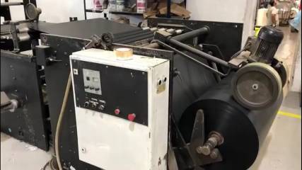 Garbage bag making machine with without draw tape picture
