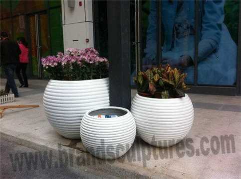 Creative Fiberglass Planters Sculptures As Holiday Decoration