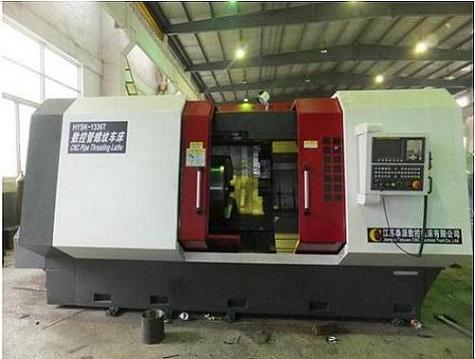 Casing pipe threading machine (slant bed)
